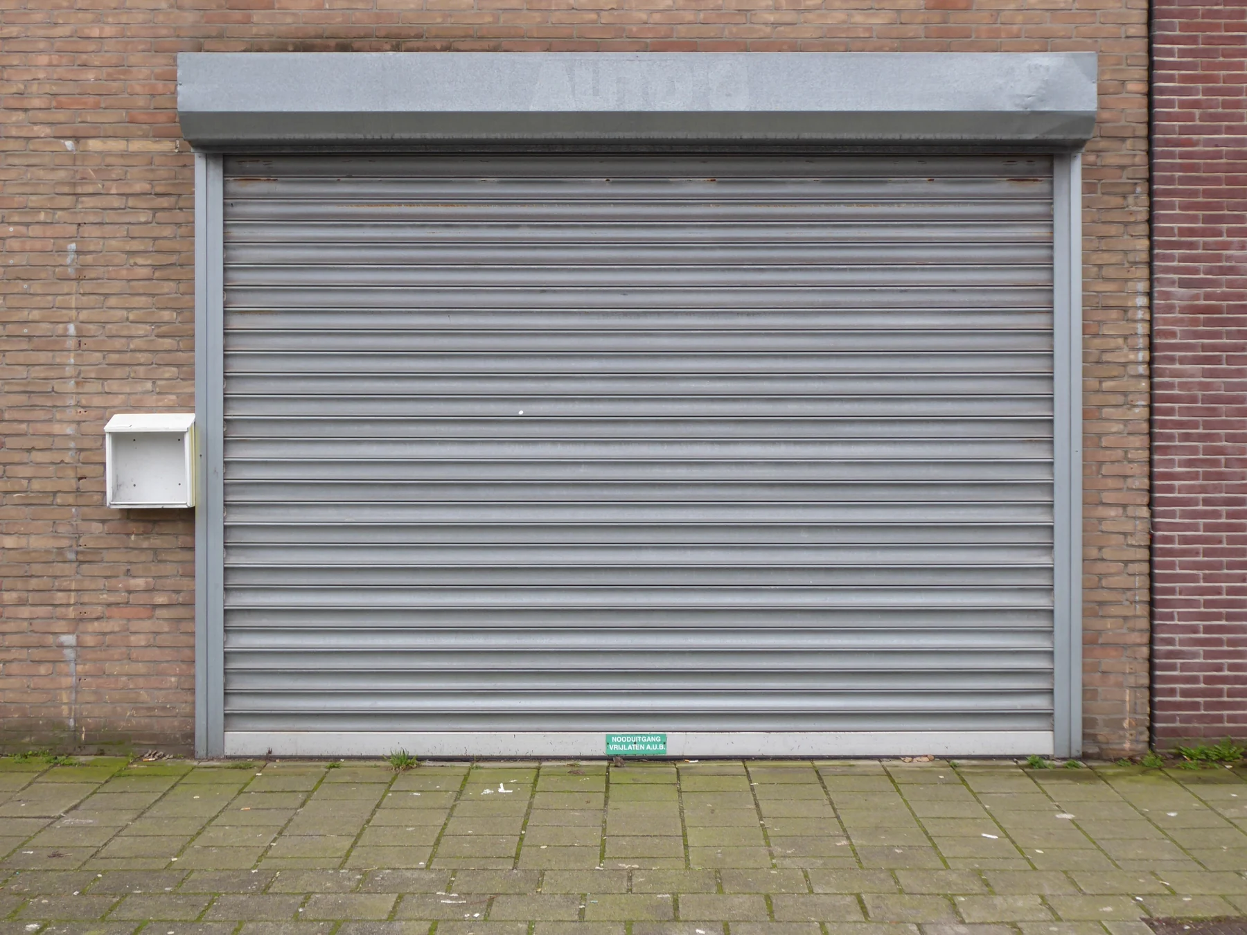 Cortina arrollable metálica para acceso comercial